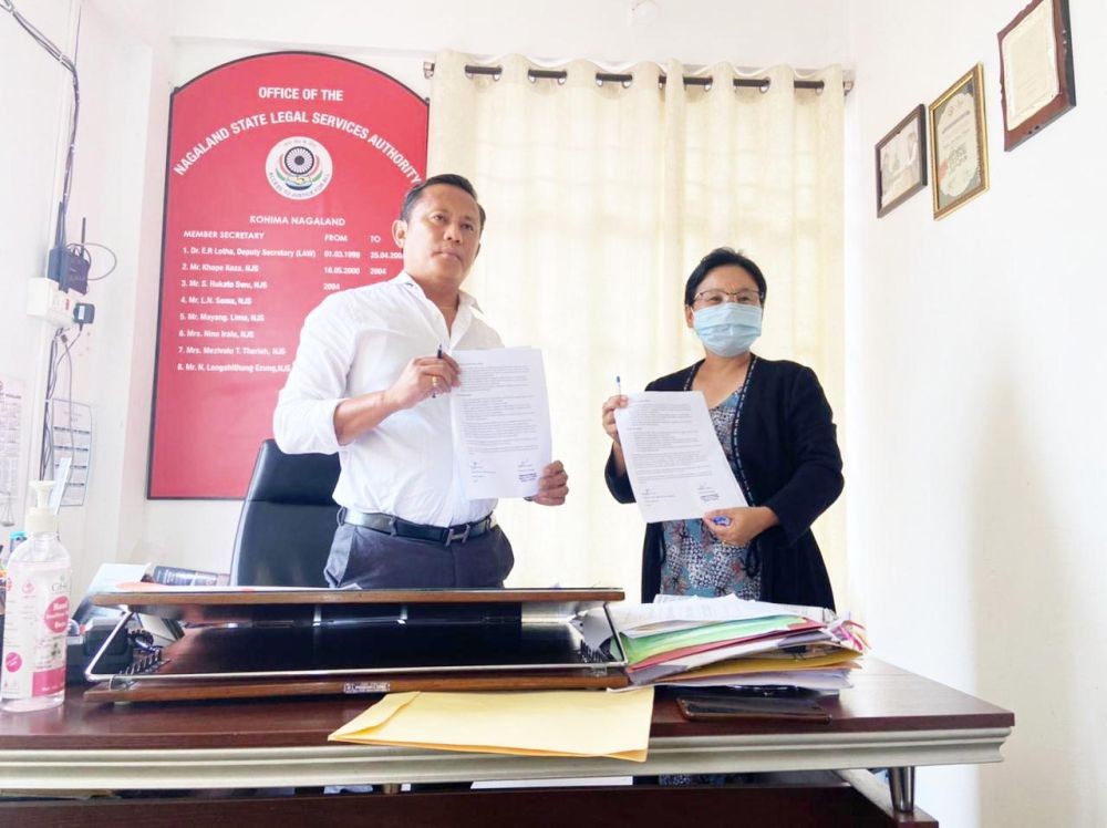 Member Secretary, N Longshithung Ezung and Programme Manager, Senior Citizens Helpline, Neithonuo Liegise during the signing on MoU at the NSLSA Member Secretary Office on July 8. (Photo Courtesy: NSLSA)